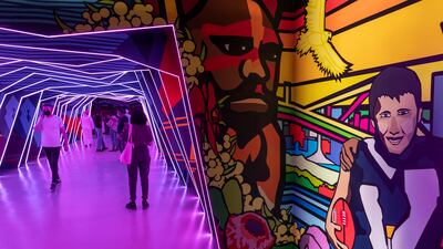 People walk through a mural-lined tunnel inside the Australian Pavilion at Expo 2020 Dubai. Photos: Antonie Robertson / The National