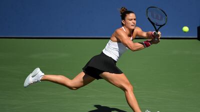 Maria Sakkari hits a backhand to Amanda Anisimova during the US Open third round. Reuters