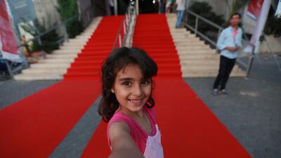 A Gaza girl poses on the red carpet in 2016. Courtesy Gaza Film Festival.