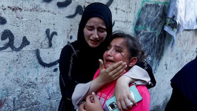 The daughter of Zakaria Abu Maamar, a member of Hamas's political office, at her father's funeral, after he was killed in an air strike in Khan Younis. Reuters