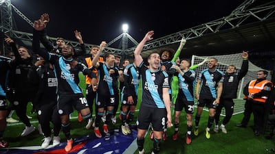 Harry Winks and his Leicester teammates celebrate winning the Championship title. Getty Images