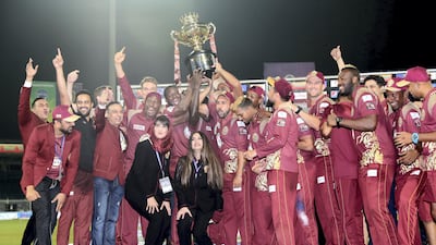 Northern Warriors lift the trophy after their victory. Chris Whiteoak / The National