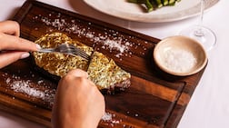 The eatery is known for its 'golden' steaks. Photo: Fumee Steakhouse