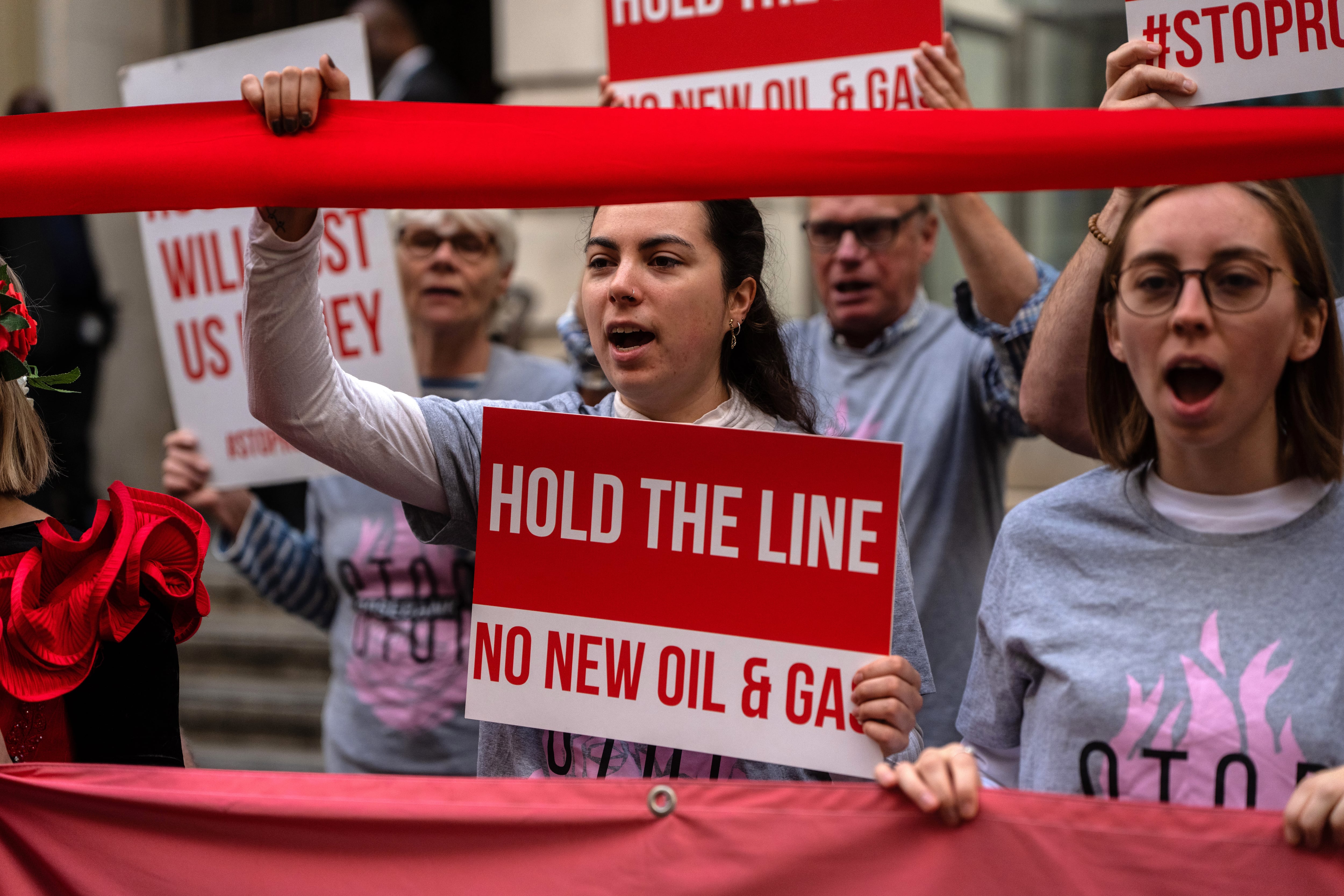 Climate activists protest outside the Department for Energy Security in London. Getty Images