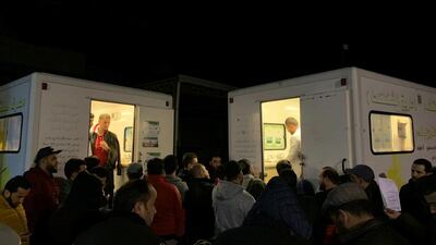 People wait outside medical facilities to donate blood after an attack on a military academy in Tripoli, Libya. REUTERS