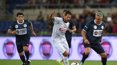 Diego Simeone, left, and Roberto Baggio during the “Match For Peace” at Rome’s Olympic Stadium on September 1, 2014. Valerio Pennicino / Getty Images