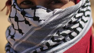 A Palestinian demonstrator looks on during a protest marking the 71st anniversary of the 'Nakba'. Reuters