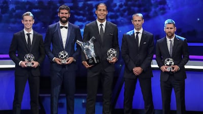 From left: Dutch midfielder Frenkie de Jong, Brazilian goalkeeper Alisson, Dutch defender Virgil van Dijk, Uefa President Aleksander Ceferin and Argentinian forward Lionel Messi pose after an awards ceremony. AFP