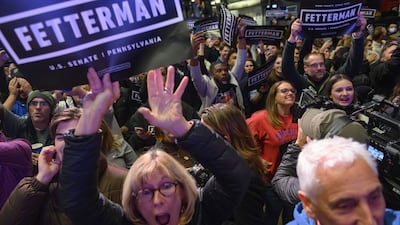 Supporters cheer during an election night event for Democratic Senate candidate John Fetterman in Pittsburgh, Pennsylvania. Mr Fetterman defeated Republican Senate candidate Dr Mehmet Oz. AFP