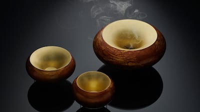 These hand-made vessels designed by Adi Toch are made using traditional silversmithing techniques. The wide opening of the incense burners help disperse the scent of burning Oud. Courtesy Irthi