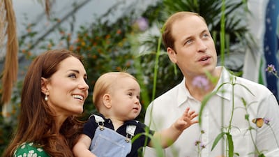 Catherine with Prince George and Prince William visiting the Natural History Museum in London in July 2014