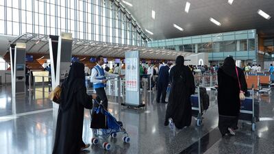 Travellers move through Hamad International Airport in Doha, Qatar. EPA