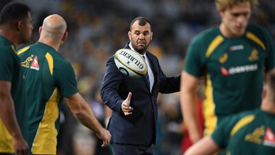 Australia coach Michael Cheika had to watch as his side was thrashed 54-34 by New Zealand on Saturday. David Moir / EPA