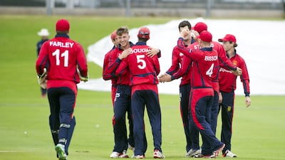 Jersey player celebrate a wicket during a warmup match against Scotland. Donald MacLeod / ICC