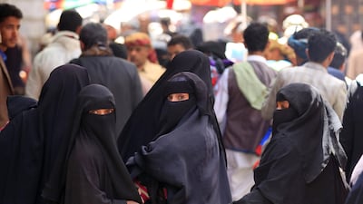 Yemeni women shop in the market in Sanaa where Houthi rebels are imposing strict rules on dress and gender segregation. AFP