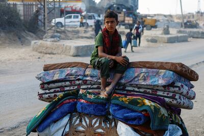 A displaced Palestinian boy fleeing northern Gaza. Reuters