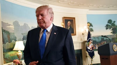 US president Donald Trump walks from the podium after speaking about Iran from the Diplomatic Reception Room at the White House in Washington, on October 13, 2017. Susan Walsh / The Associated Press