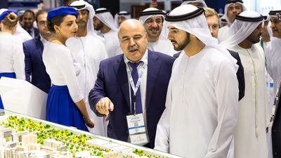 Sheikh Hamdan bin Mohammed, Crown Prince of Dubai, is pictured with Mirwais Azizi, chairman of Azizi Developments at the developer’s stand at Cityscape Global. The developer said it has sold out phase one of its Riviera project. It said it has also sold 50 per cent of its phase two units on the first day of Cityscape. The project is located in the Meydan One district. Once complete, the project will deliver at least 6,273 units of studio, one and two-bedroom apartments situated along the Dubai Canal, with views of Downtown Dubai and other landmarks. Courtesy Azizi