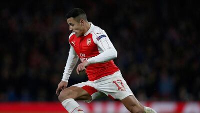 Arsenal's Chilean striker Alexis Sanchez controls the ball during the UEFA Champions League round of 16 1st leg football match between Arsenal and Barcelona at the Emirates Stadium in London on February 23, 2016. / AFP / ADRIAN DENNIS