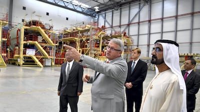 Sheikh Mohammed is briefed on the interior design of the A380 fleet and its exterior painting by Andreas Fehring, Head of Airbus Plant Hamburg, and Andreas Foerster, Chairman of Airbus Group. Wam