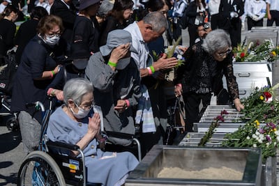 People pray after the Peace Memorial Ceremony marking the 81st anniversary of the atomic bombing of Hiroshima in Japan. Getty Images
