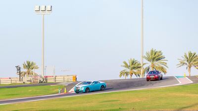 Two cars head into the corkscrew. Courtesy Abu Dhabi Motors