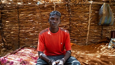Twenty-four-year-old Sudanese refugee Albakir Abbas Ishag poses for a photograph inside his shelter in the Koufroun refugee camp. All photos AFP