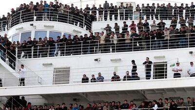 Thousands of expatriates reach ports across the Mediterranean, as thousands more still scramble to flee the turmoil in Libya.