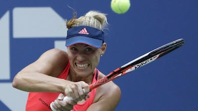 Angelique Kerber of Germany hits a return to Karolina Pliskova. Jason Szenes / EPA