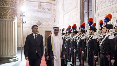 Sheikh Mohammed bin Zayed, Crown Prince of Abu Dhabi and Deputy Supreme Commander of the Armed Forces, second left, is received by Matteo Renzi, Prime Minister of Italy, left, at the Museo di Palazzo Vecchio. Ryan Carter / Crown Prince Court - Abu Dhabi