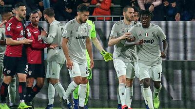 Juventus' Leonardo Bonucci, second right, has said he was too hasty in comments made about Moise Kean, right, after the latter's celebration against Cagliari in reaction to being the victim of racist chants. ANSA via AP