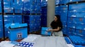 An Israeli worker prepares packing of ballots and polling station equipment at the Central Elections Committee's Logistics Center in Shoham. Getty Images