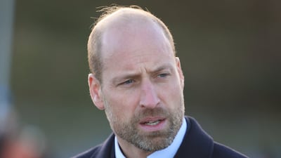 The Prince of Wales offered a 'moment of comfort' to some of the 50 children and their immediate families. Reuters