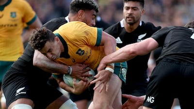 New Zealand's Hoskins Sotutu tackles Australia's Tomas Banks. AFP