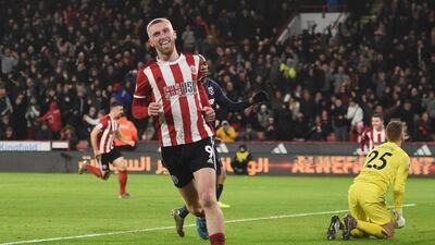 Sheffield United striker Oliver McBurnie celebrates scoring the opening goal against West Ham United at Bramall Lane. AFP