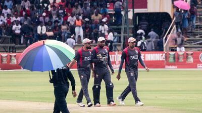 UAE players walk off the field after a light drizzle interrupted play during the fourth ODI against Zimbabwe at Harare Sports Club on Tuesday. Zimbabwe Cricket