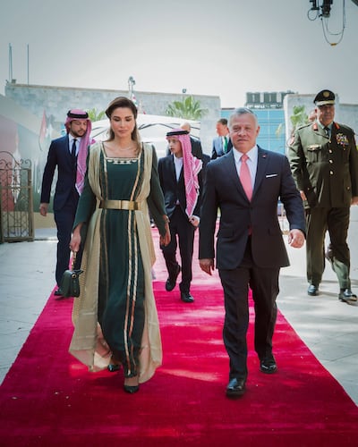 Queen Rania in a green and gold kaftan and bisht in 2019. Photo: Royal Hashemite Court