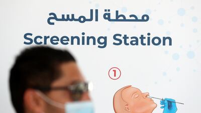 The new screening drive through for COVID-19, Zayed Sports City, Abu Dhabi. Chris Whiteoak / The National