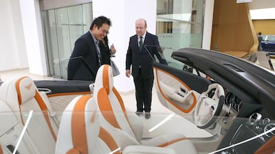Visitors view an open-top Bentley at the new Al Habtoor Motors and Bentley Emirates f showroom on Dubai. Ravindranath K / The National