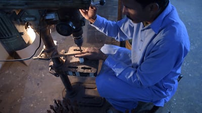 Umer Farooq is the third generation to take up the bagpipe-making tradition in Pakistan, which is thousands of kilometres from Scotland yet sells thousands of bagpipes each year. AFP.