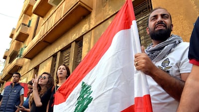 Protesters shout slogans in front of the Lebanese Minister of Telecommunications Mohammad Choucair's house during ongoing anti-government in Beirut. EPA