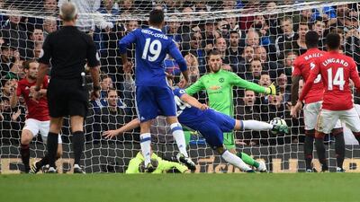 Chelsea’s Gary Cahill, centre, scores the second goal. Facundo Arrizabalaga / EPA