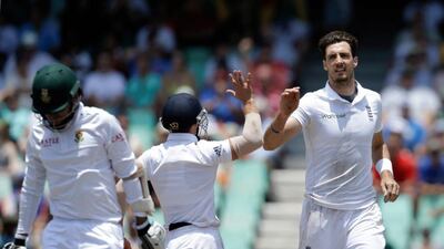 England seamer Steve Finn, right, took three South Africa wickets at Durban on Tuesday. Themba Hadebe / AP Photo