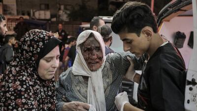 Palestinians injured in Israeli raids arrive at Nasser Hospital in Khan Younis, southern Gaza. Getty Images