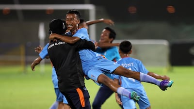 Player of Minerva Academy celebrate after winning the U12 Mina Cup final against La Liga HPC at Jebel Ali Centre of Excellence.