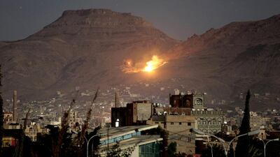 Fire and smoke rise after a Saudi-led airstrike hit a site believed to be one of the largest weapons depots on the outskirts of Yemen's capital, Sanaa, on Friday, October 14, 2016. Hani Mohammed / AP Photo