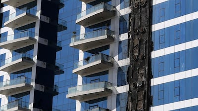 A building in the Oceana Complex on Palm Jumeirah in Dubai is damage by a fire, which broke out on Monday night. Pawan Singh / The National