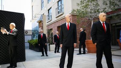 People dressed as Agent 47 promote IO Interactive AS’ Hitman video game during Comic-Con. Patrick T. Fallon/Bloomberg