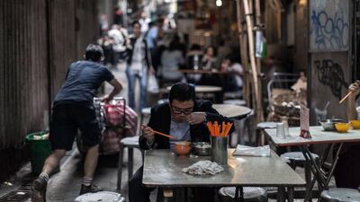 Hong Kong's street food stall – called dai pai dong in Cantonese – is at risk of being phased out in the midst of rising high-rises and concerns about hygiene. Anthony Wallace/ AFP Photo