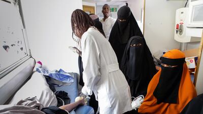 Somali women look on holding blood bags as they wait to give blood inside a blood donation truck during a blood donation event for the victims of the Mogadishu attack in the Somali neighbourhood Eastleigh in the Kenyan capital Nairobi, Kenya, 17 October 2017.